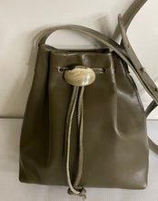 Load image into Gallery viewer, &lt;b&gt;Darlene&lt;/b&gt;&lt;br&gt; &lt;p&gt;&lt;font size=“3px”&gt; Olive Leather Drawstring With Bow&lt;/font&gt;&lt;/p&gt;
