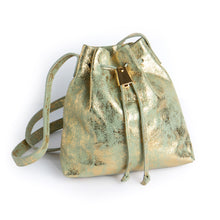 Load image into Gallery viewer, &lt;b&gt;Darlene&lt;/b&gt;&lt;br&gt; &lt;p&gt;&lt;font size=“3px”&gt; Green Metallic Leather Drawstring With Metal Closure&lt;/font&gt;&lt;/p&gt;
