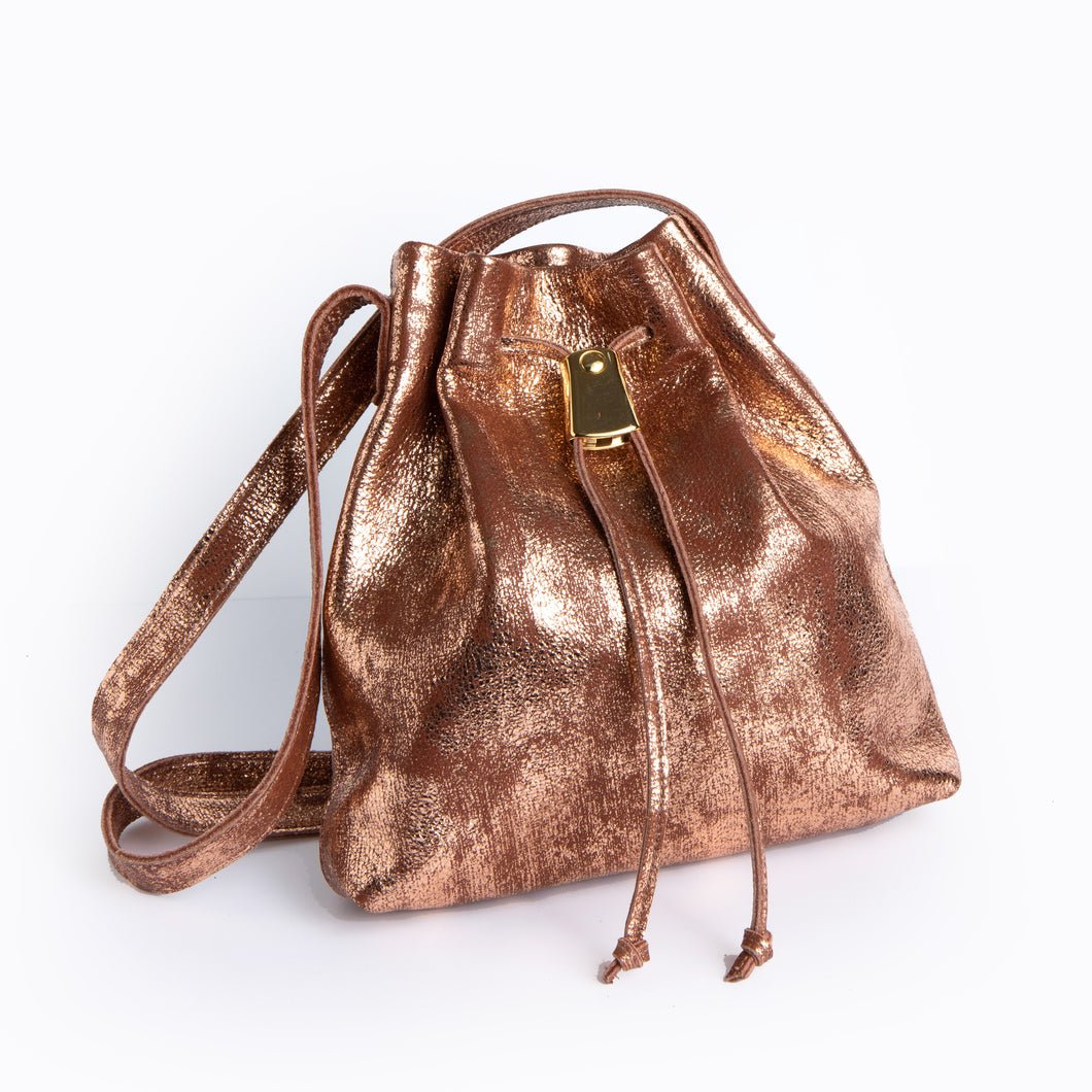 <b>Darlene</b><br> <p><font size=“3px”> Copper Leather Drawstring With Metal Closure</font></p>