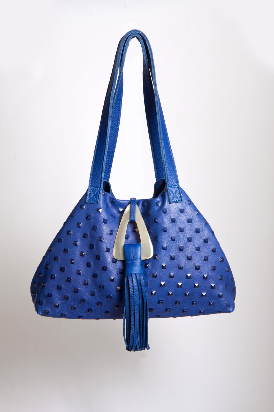 <b>Stacie</b><br> <p><font size=“3px”> Cobalt Pyramid Tote With Horn Tassel</font></p>