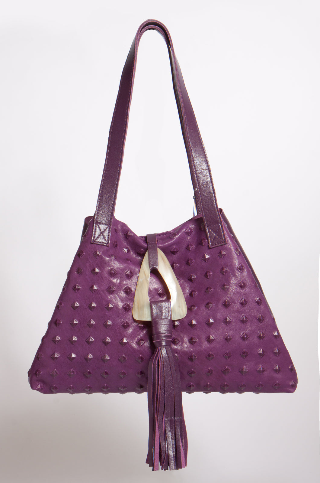 <b>Stacie</b><br> <p><font size=“3px”> Purple Pyramid Tote With Horn Tassel</font></p>