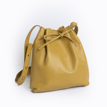 Load image into Gallery viewer, &lt;b&gt;Darlene&lt;/b&gt;&lt;br&gt; &lt;p&gt;&lt;font size=“3px”&gt; Mustard Leather Drawstring With Metal Closure&lt;/font&gt;&lt;/p&gt;
