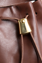 Load image into Gallery viewer, &lt;b&gt;Darlene&lt;/b&gt;&lt;br&gt; &lt;p&gt;&lt;font size=“3px”&gt; Cognac Leather Drawstring With Bow&lt;/font&gt;&lt;/p&gt;

